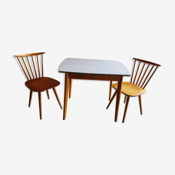 Together two Scandinavian chairs and its wooden and formica table