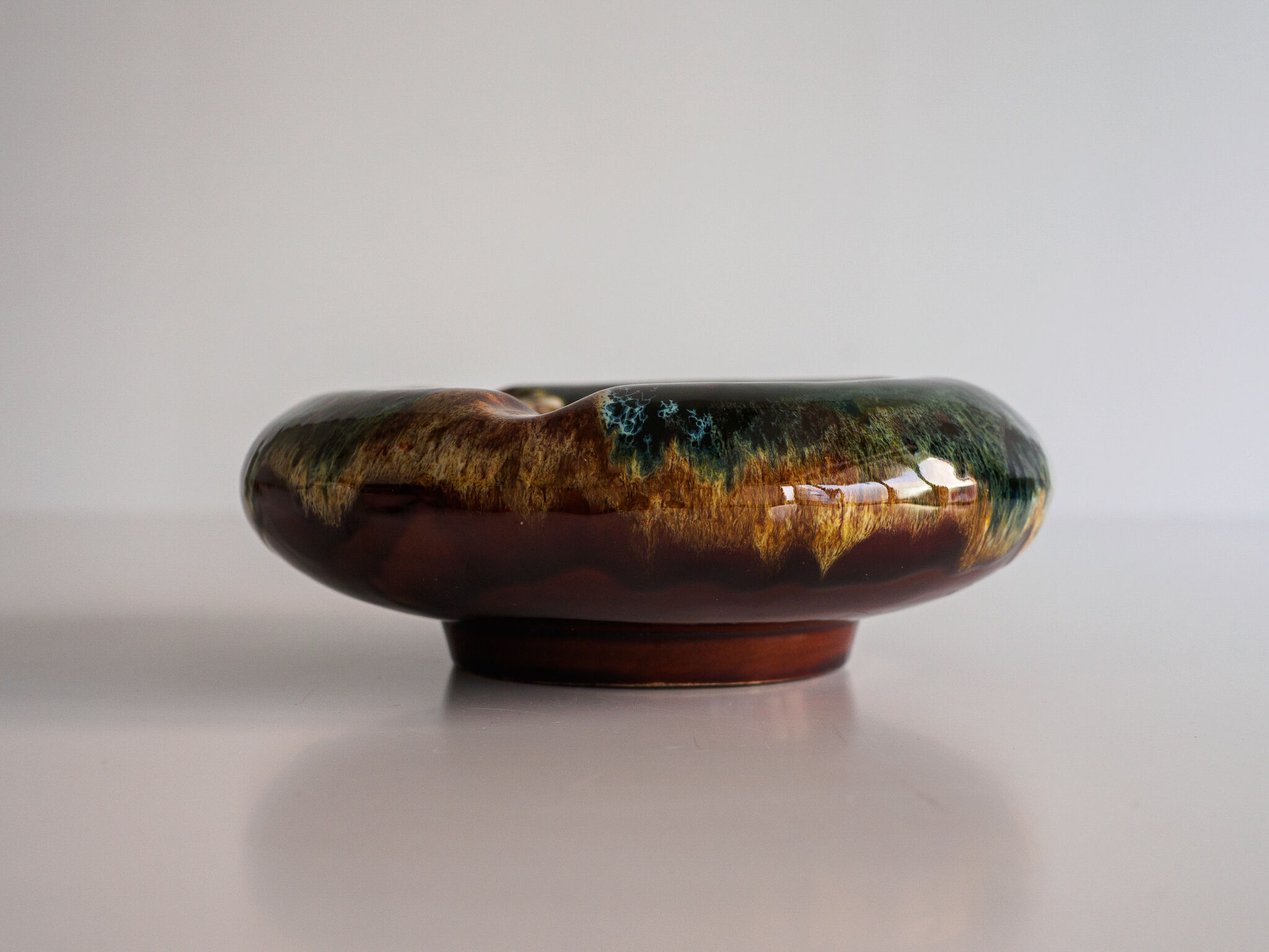 Multicolored ceramic ashtray