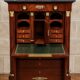 Rare four-column secretary from the Empire period in flame mahogany and bronze.