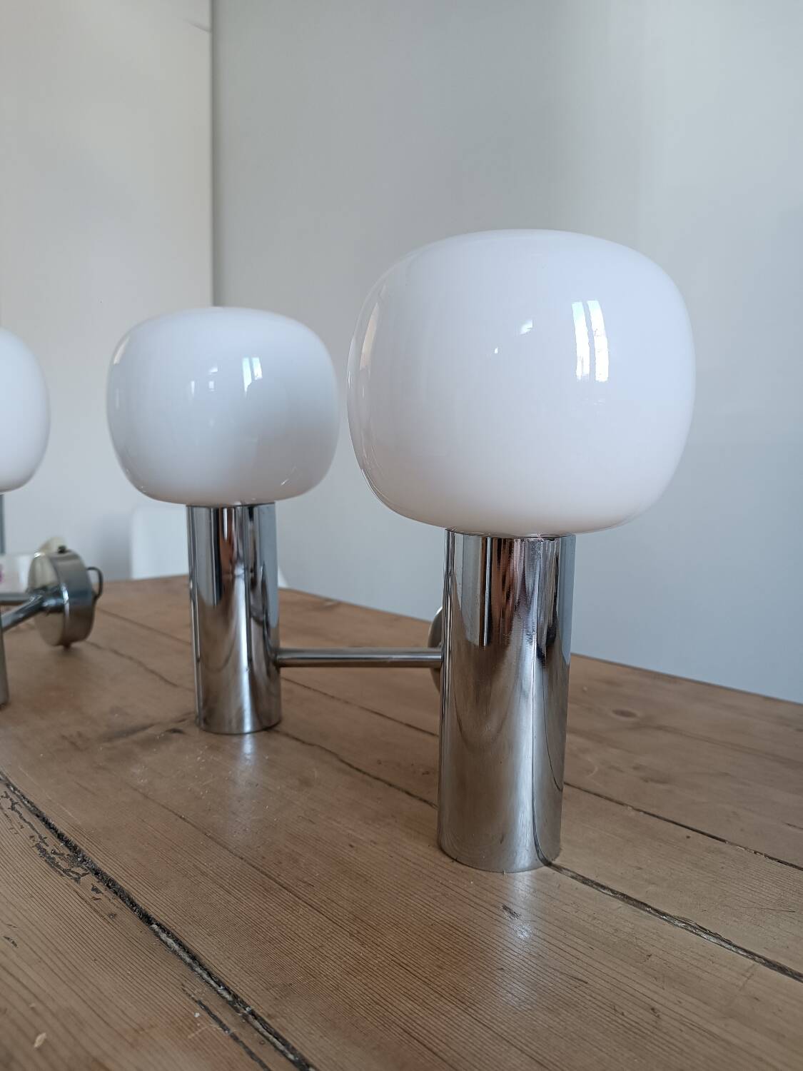 Pair of vintage wall lights in chromed metal and opaline 1970