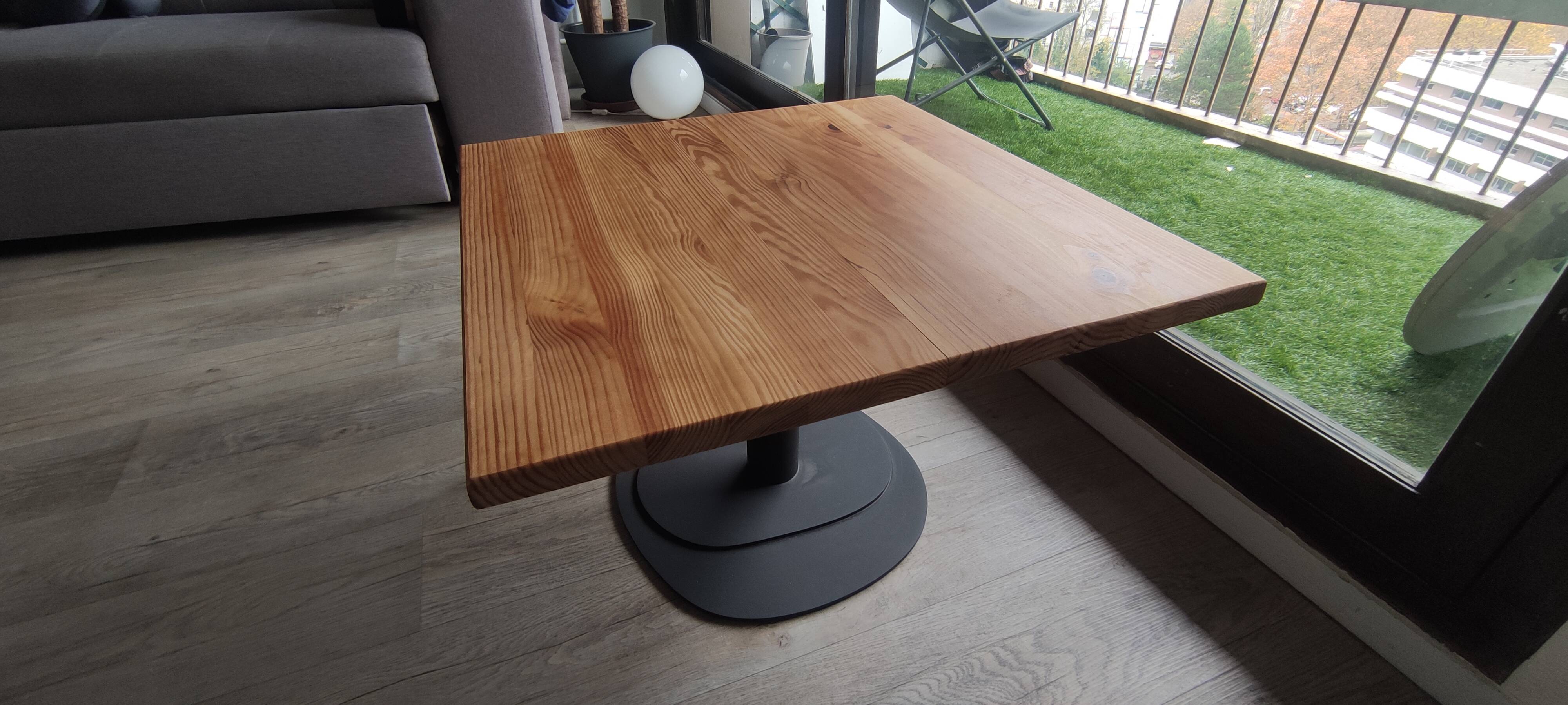 Solid wood coffee table in industrial style