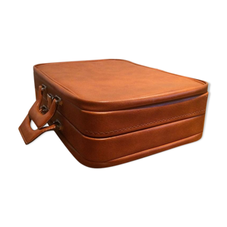 Tawny vintage leather suitcase