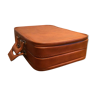 Tawny vintage leather suitcase