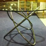 Round table in chrome and glass