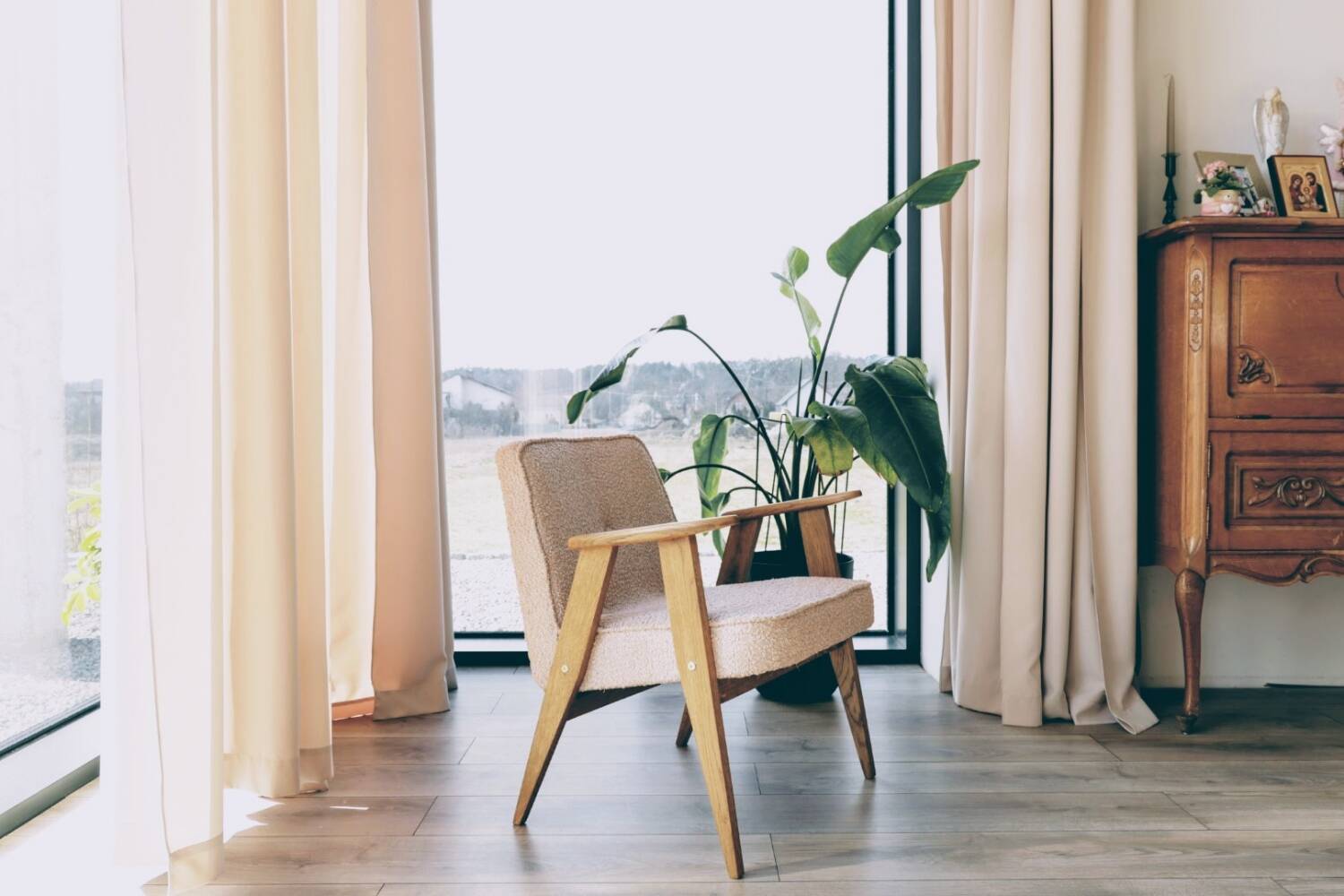 Vintage armchair in oak wood with powder pink boucle design by Chierowski.