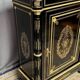 Napoleon III style commode, decorated with brass marquetry and gilded bronze mounts.