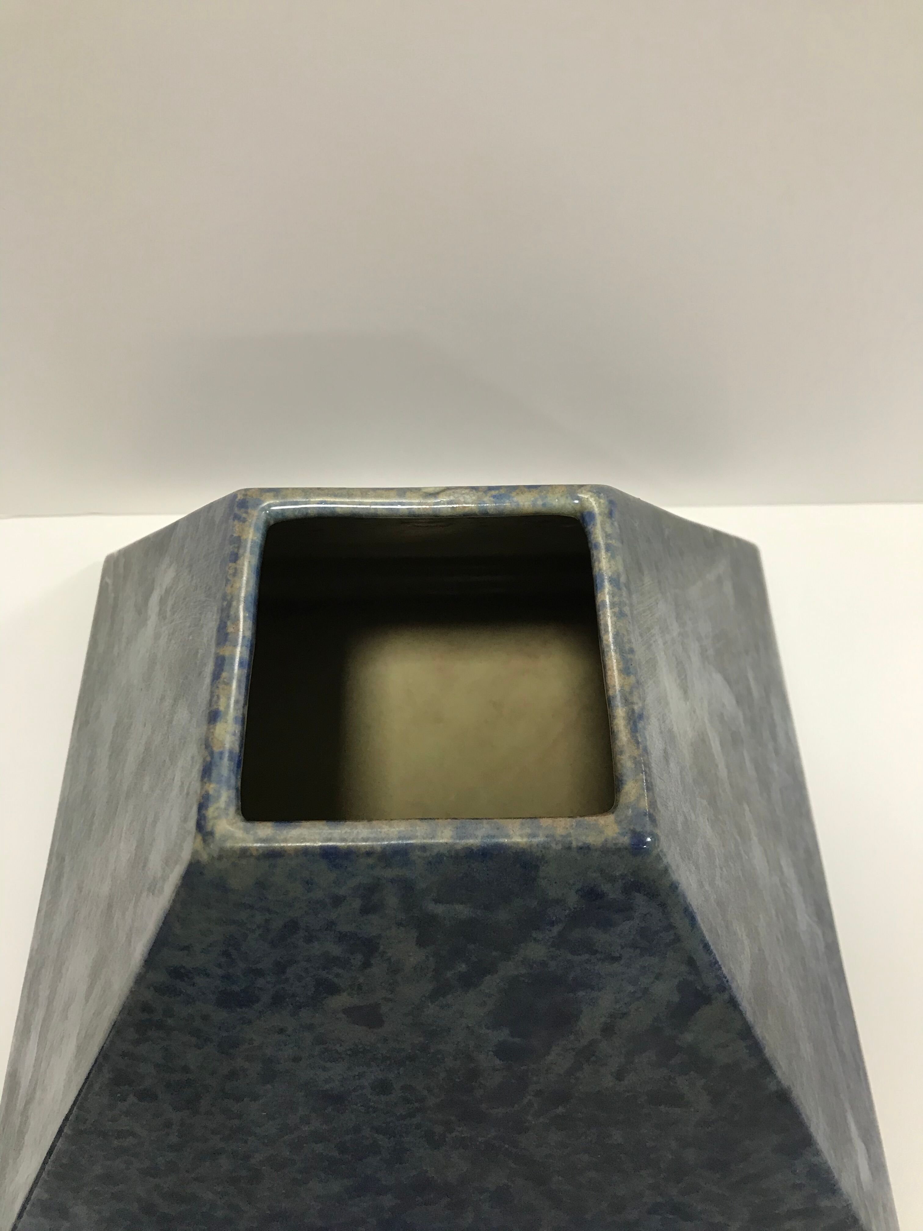 Pyramid-shaped ceramic covered box