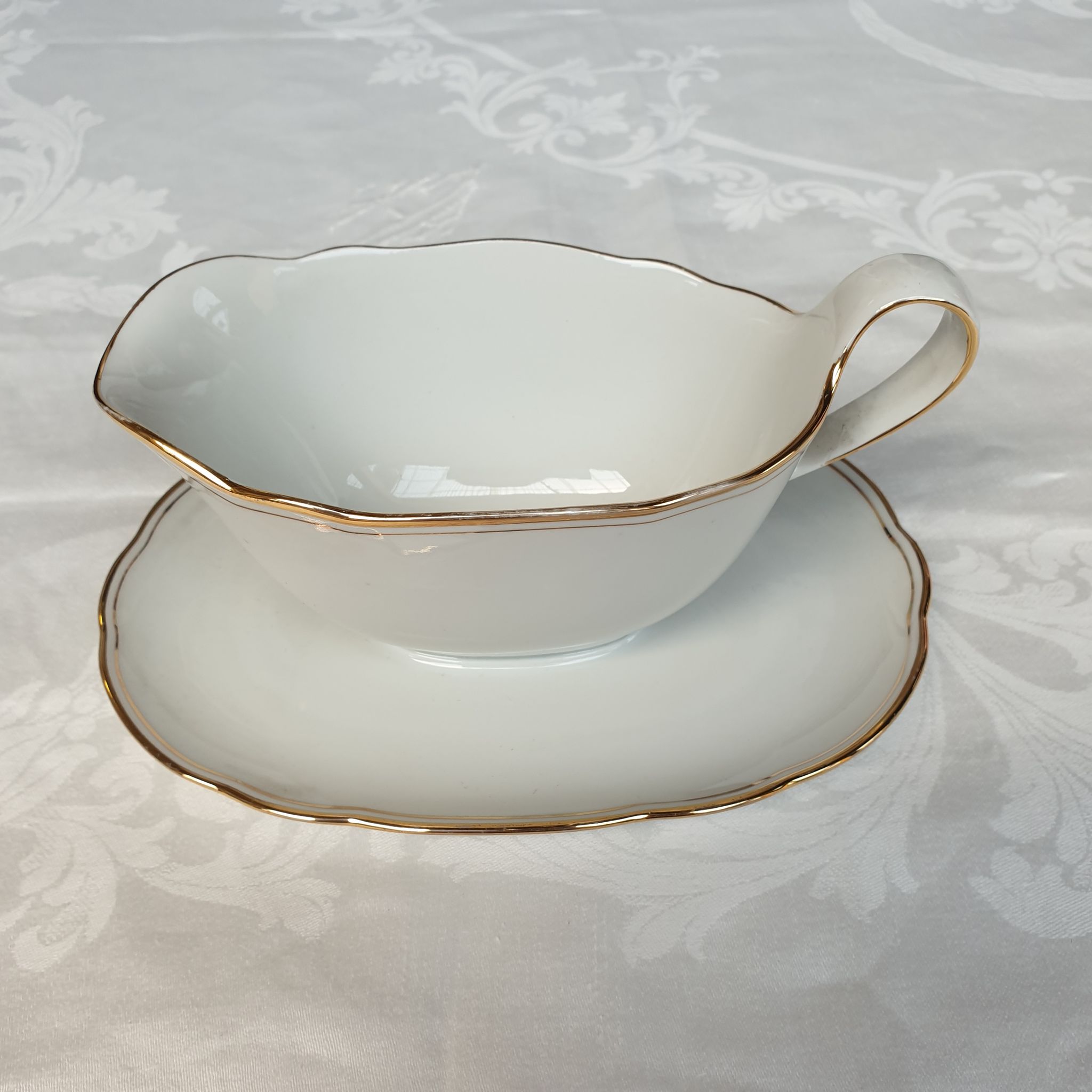 Early 20th century white porcelain saucière