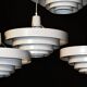 Saturn pendant light in satin white lacquered metal