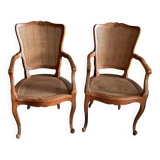 Pair of convertible armchairs in walnut and TBE canework