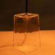 Minimalist glass table lamp from the 80s with a pleated shade.