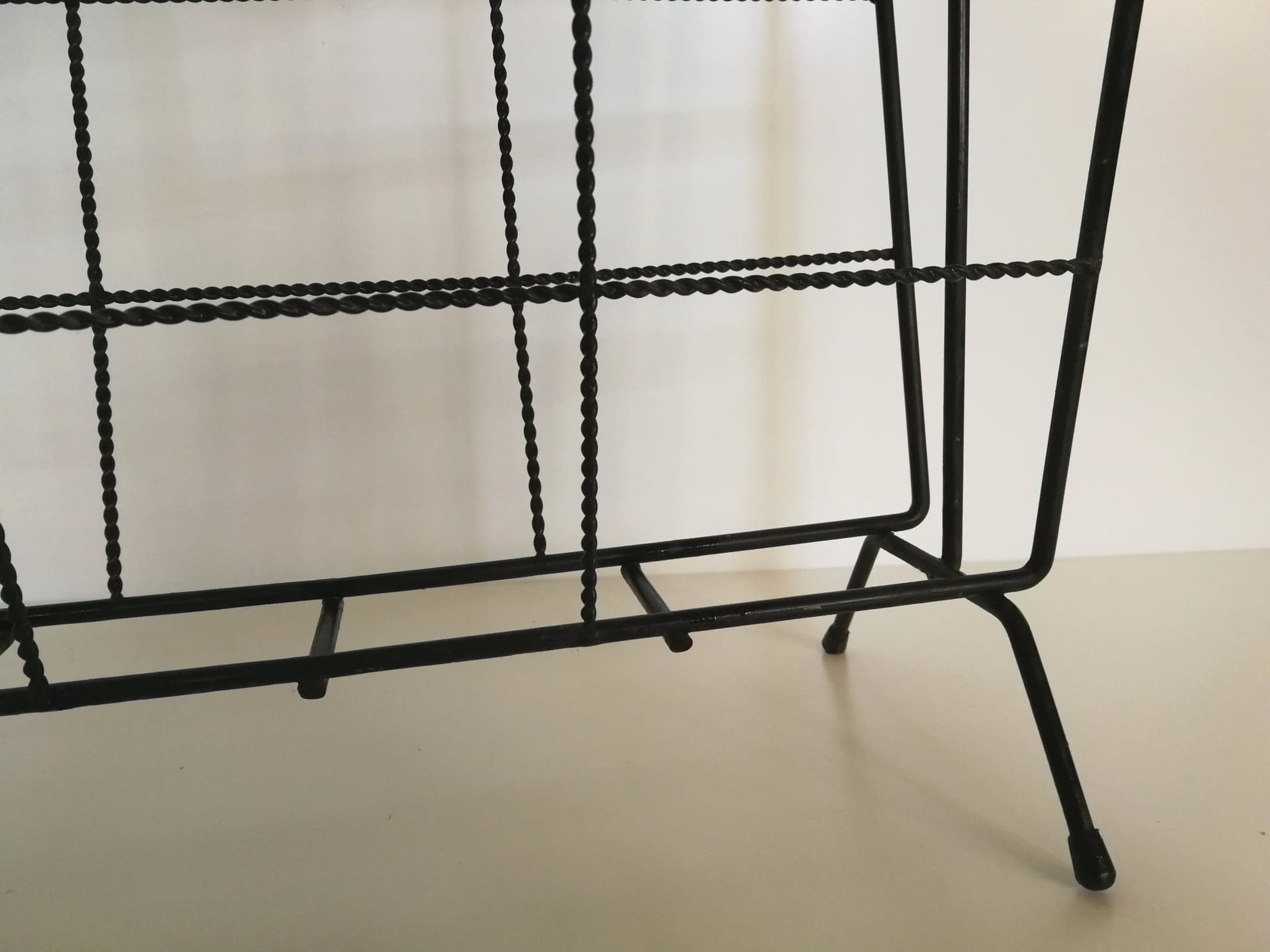 Vintage metal magazine rack