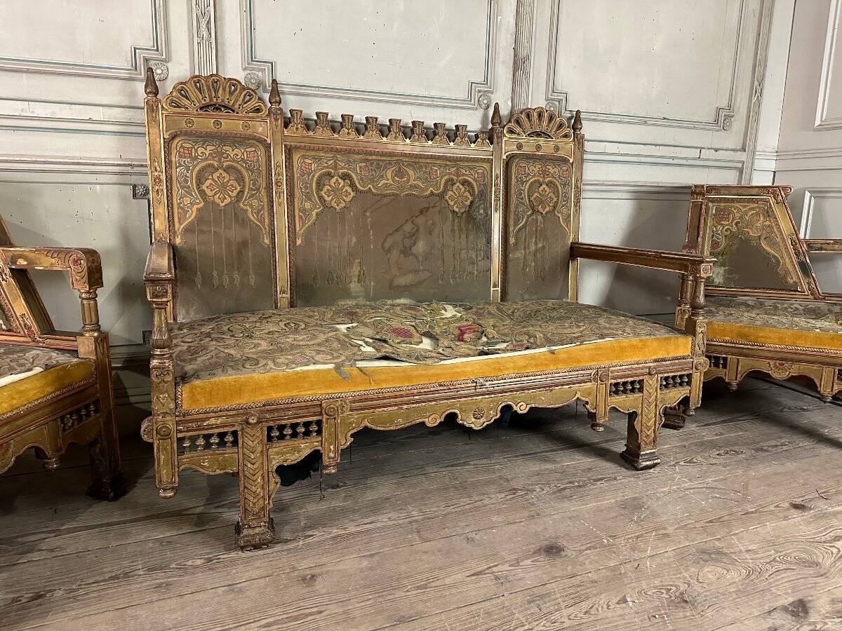 Pair of corner armchairs and an Orientalist bench in carved and polychrome wood from around 1900.
