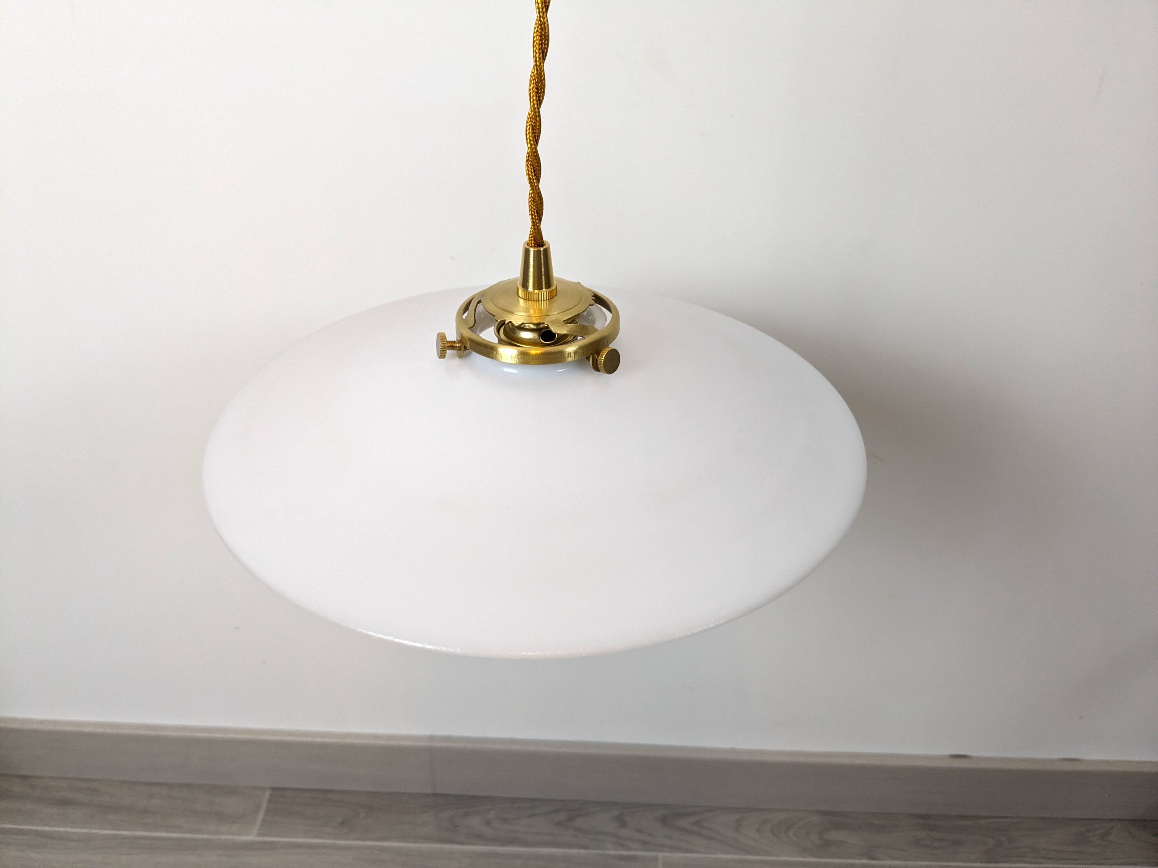 Vintage suspension in white opaline, elegant light fixture with soft light.