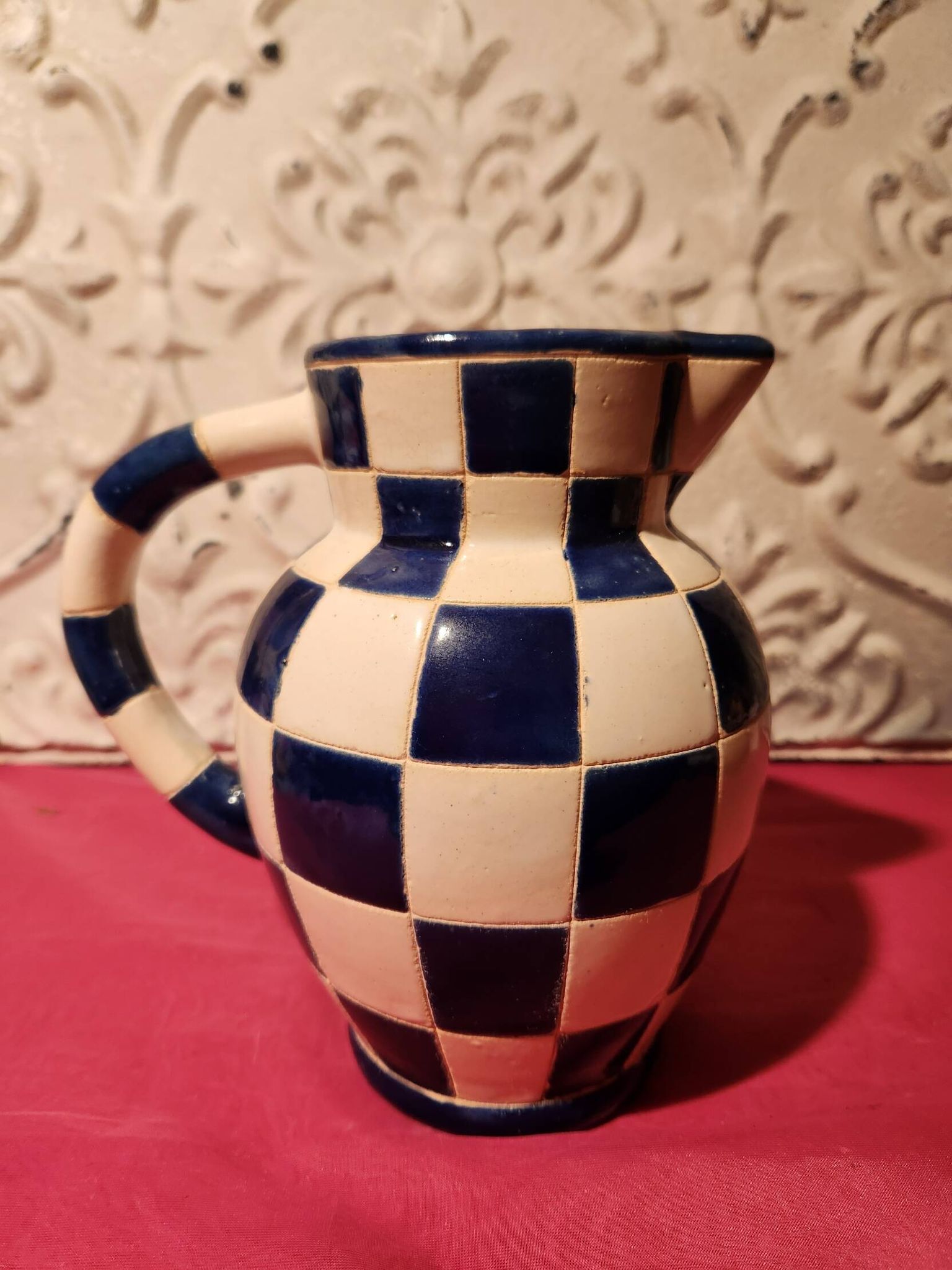 Ceramic jug with blue and white checkered pattern "Lustucru"