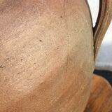 Old jug with two sandstone handles