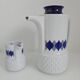 Vintage Schirnding Bavaria coffee pot and milk jug, blue geometric pattern.