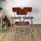 Trio of chairs in light brown formica and cream contour 70s
