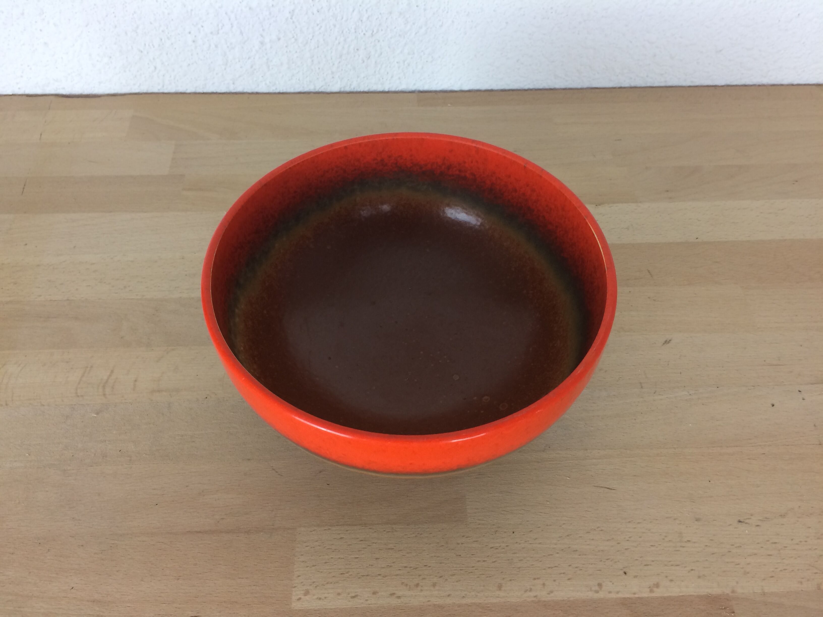 Orange and brown ceramic salad