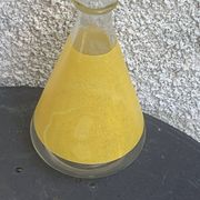 Liqueur set consisting of a glass carafe and 8 small yellow glasses