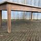 Antique farmhouse table in solid oak with tapered legs and 1 drawer at the end.