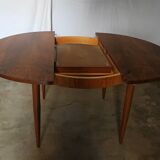 Table ronde en palissandre avec rallongedes années 70