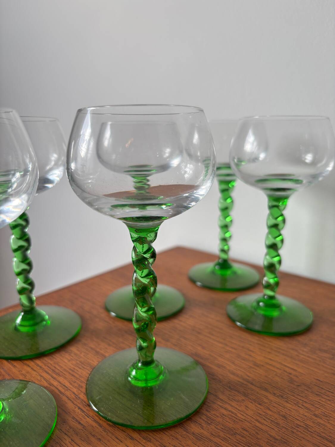 Set of green twisted stem white wine glasses – blown glass