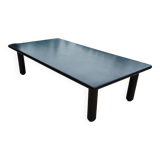 Old vintage wooden coffee table with tubular base