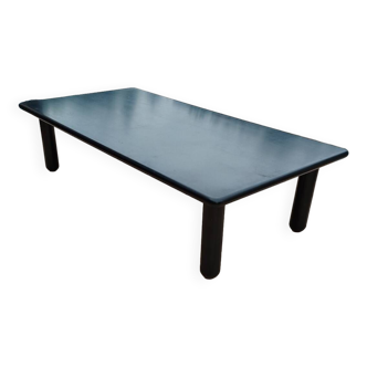 Old vintage wooden coffee table with tubular base