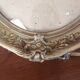 Golden oval frame XXth