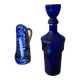 Set liquor bottle with candle holder