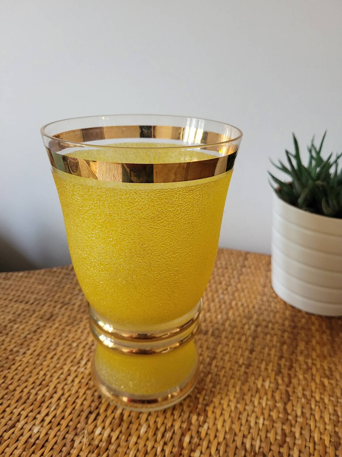 Yellow and gold granite vase