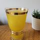 Yellow and gold granite vase