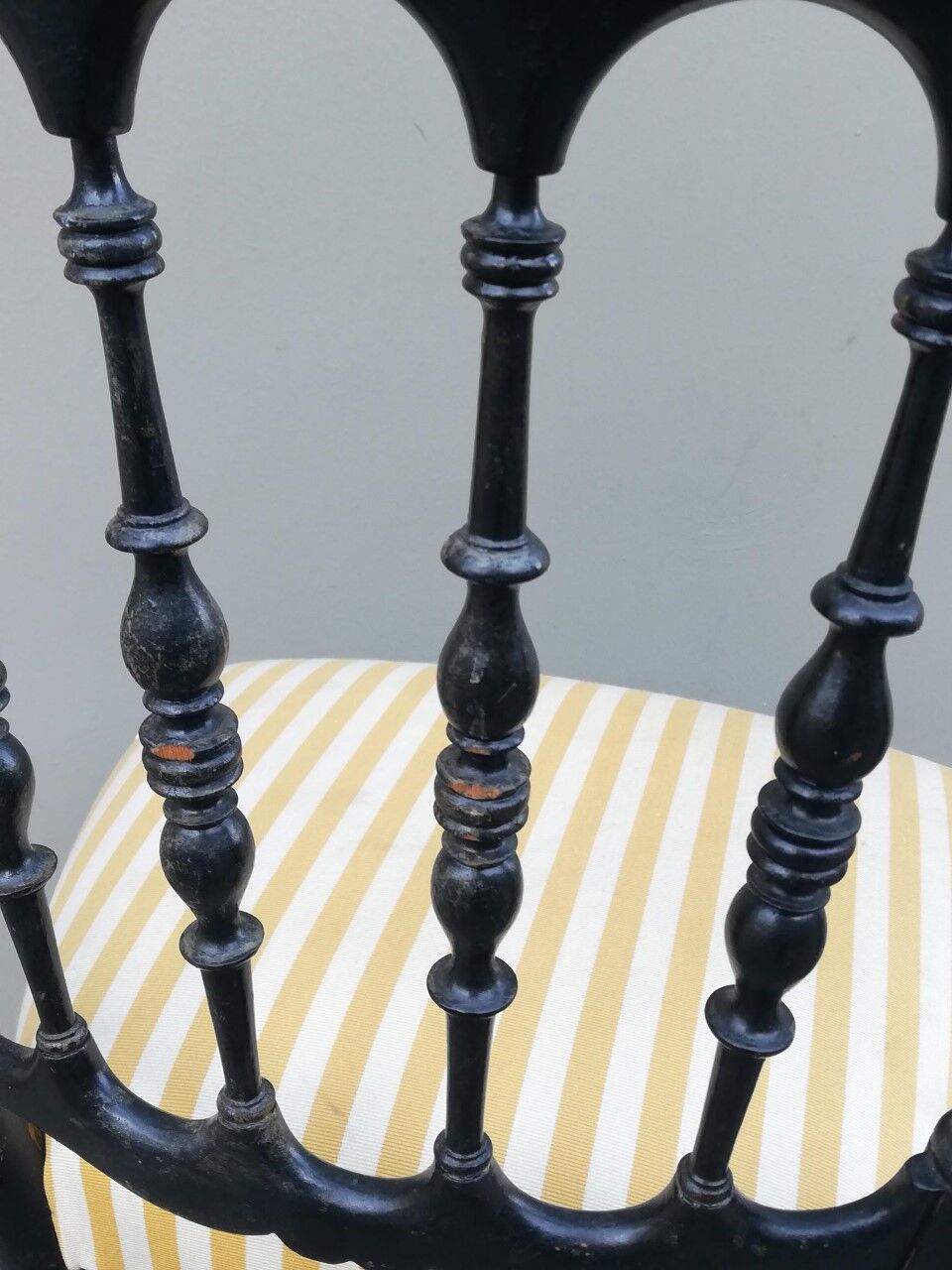 Napoleon III chair late 19th in blackened wood with gilded patterns