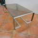 Coffee table with stainless steel base and smoked glass, from the 70s