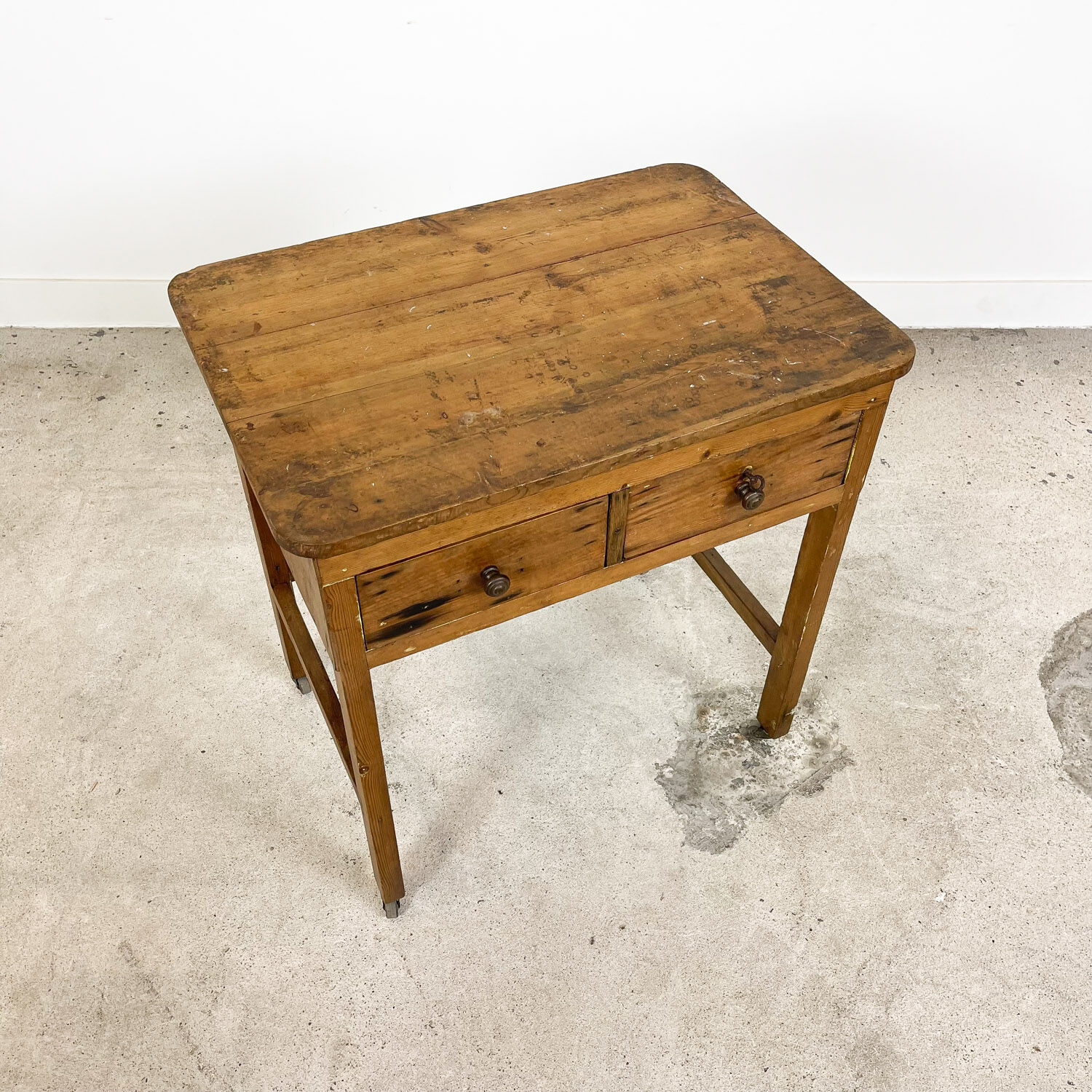 Vintage industrial wooden side table with drawers on casters