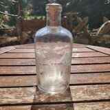 Flacon en verre gravé