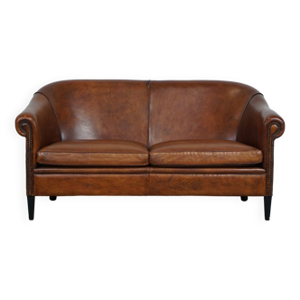 Beautiful and well-maintained spacious sheepskin leather 2-seater club sofa