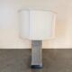 Stainless steel and suede lamp