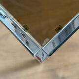 Large designer coffee table from the 70s in chrome, smoked glass, and faux leather.