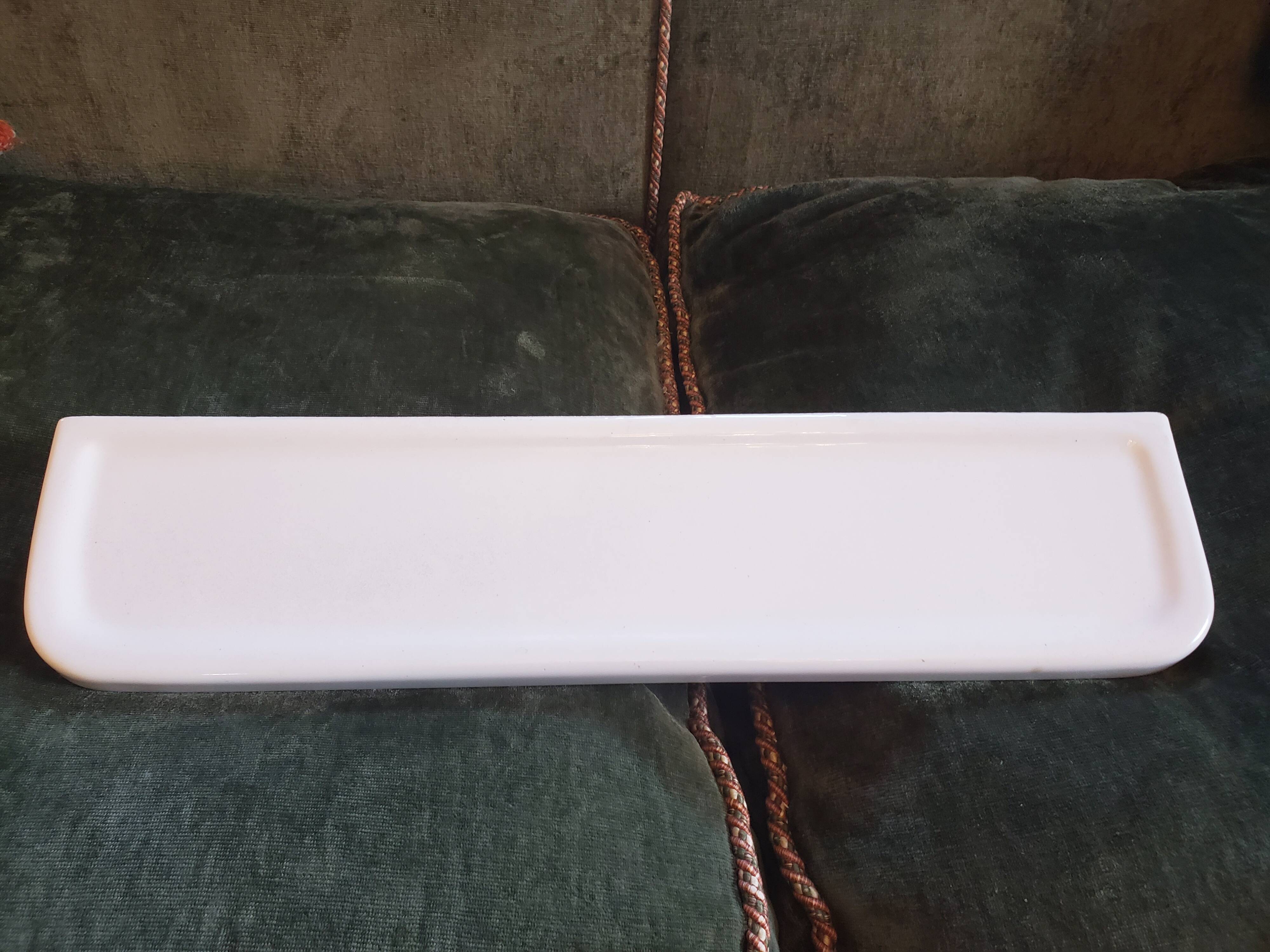 White ceramic bathroom shelf