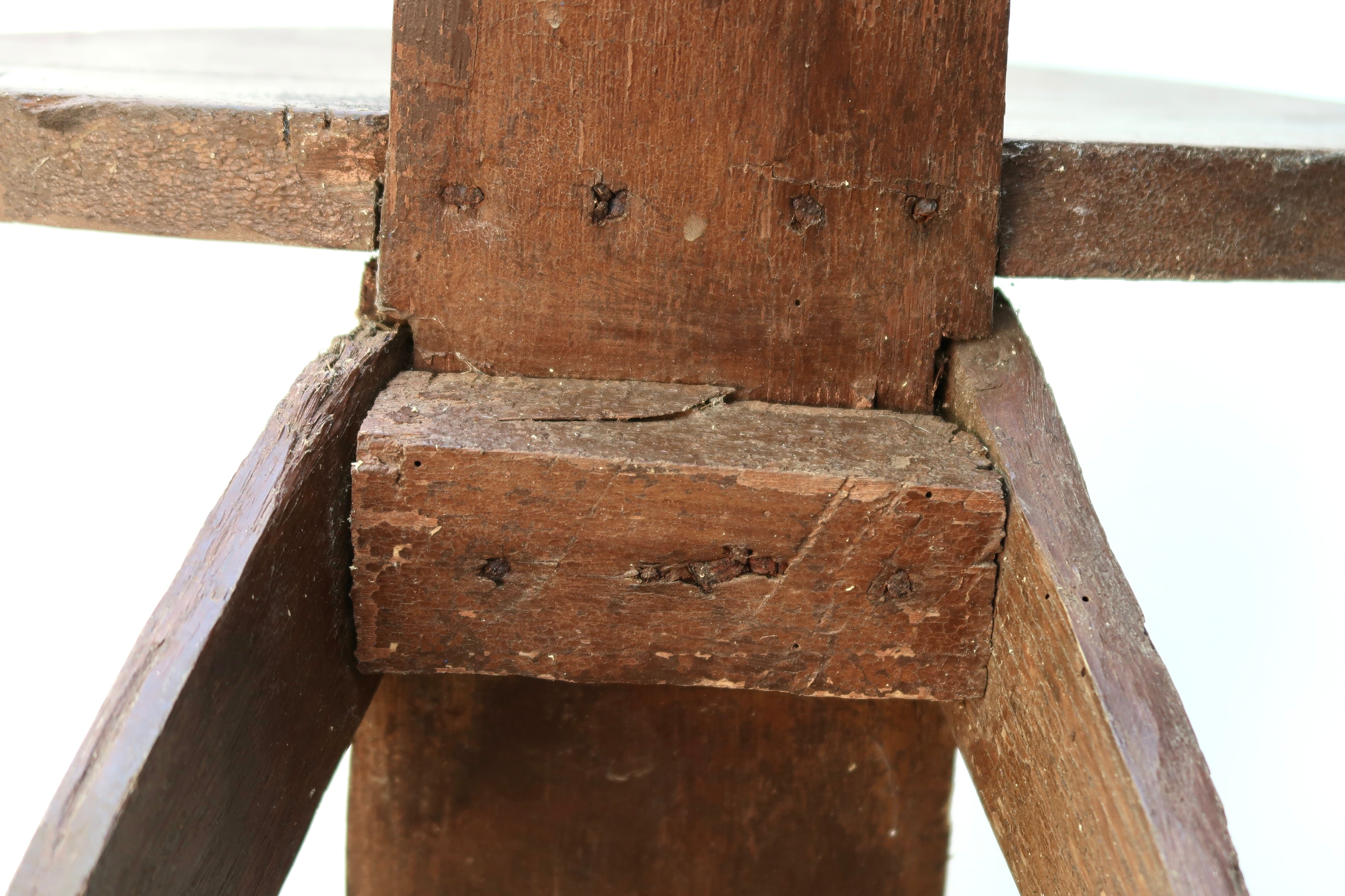 Regionalist wooden tripod chair