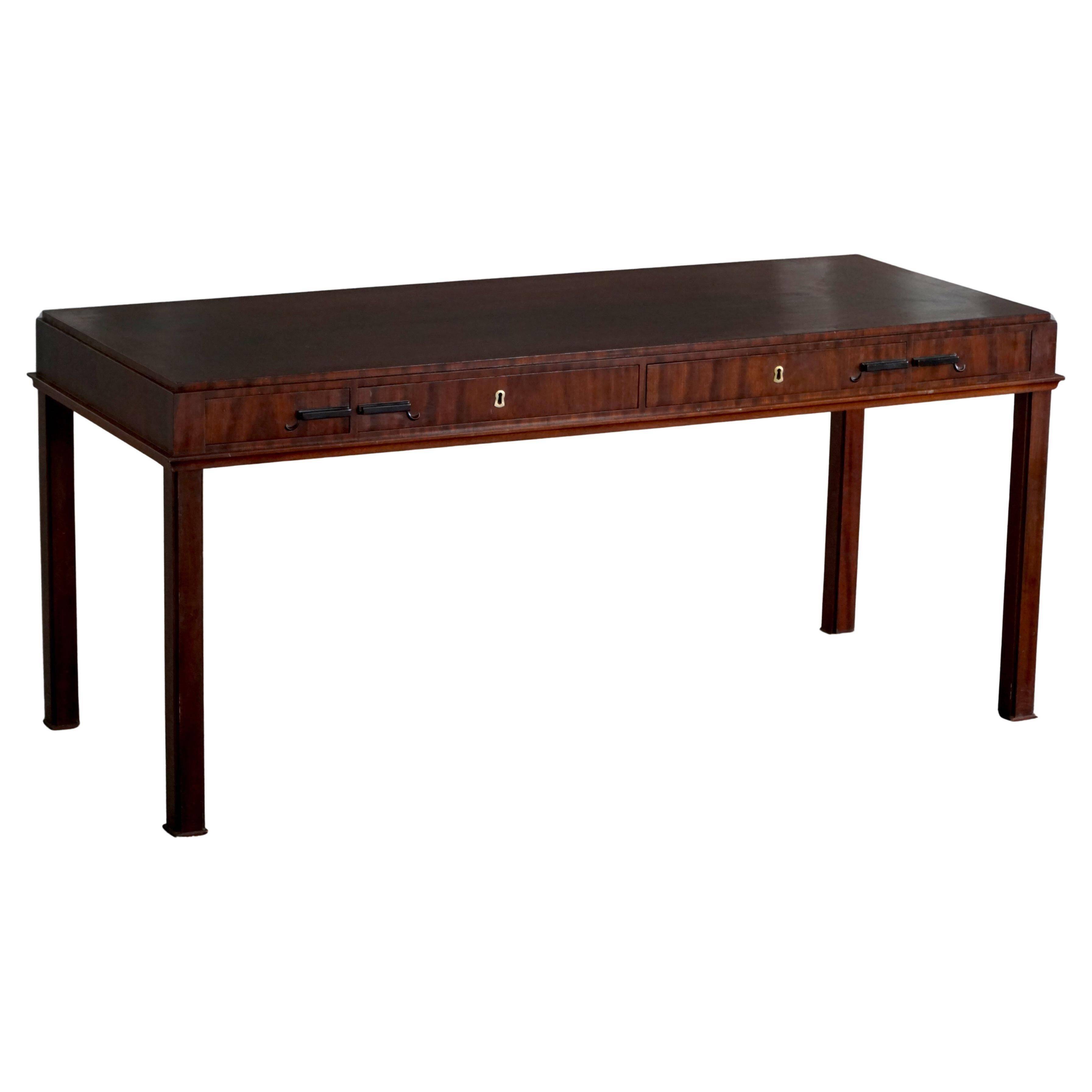Mid-20th century mahogany writing desk by a Danish cabinetmaker, 1950s.
