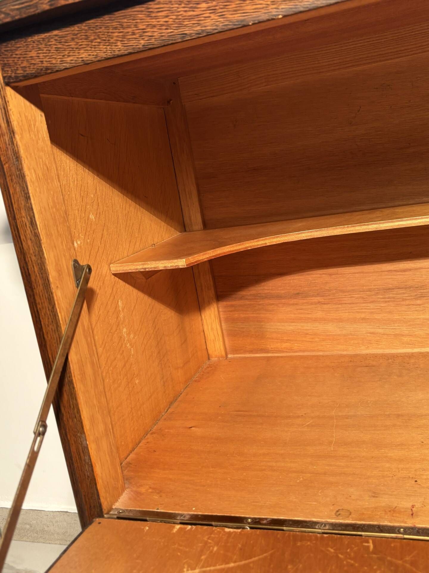 Louis XV style oak TV cabinet with drop-down flap.