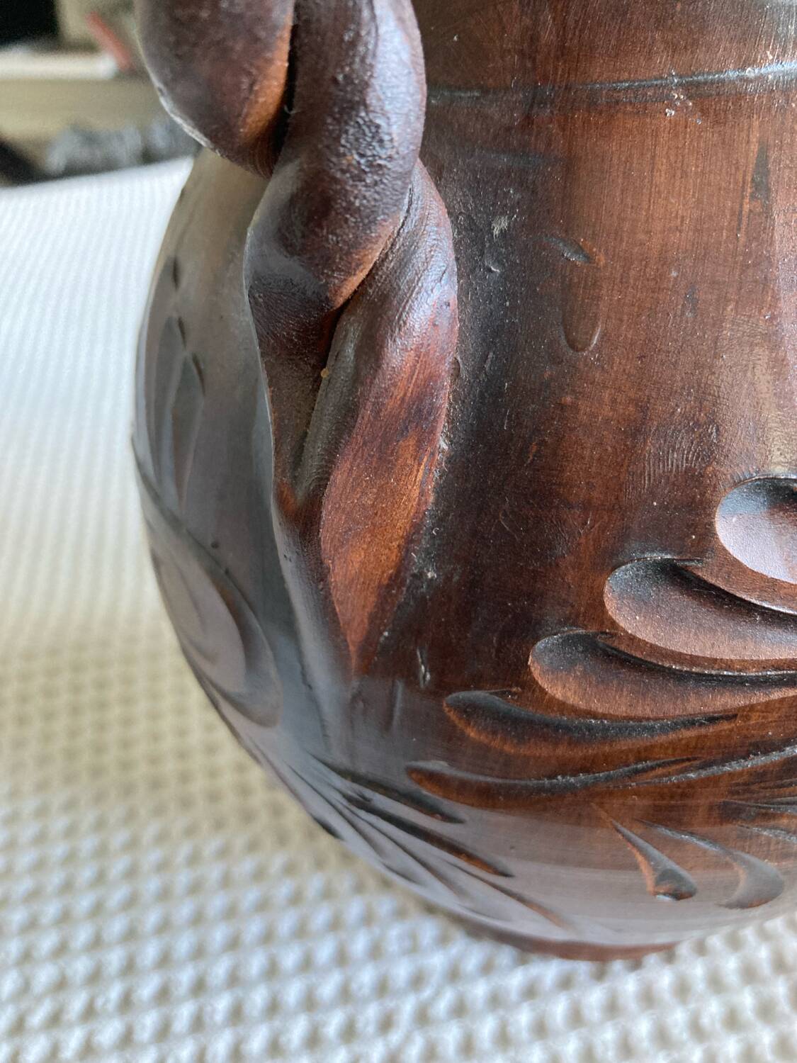 Scarified ceramic vase with twisted handle - African style