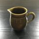 Olive milk jug