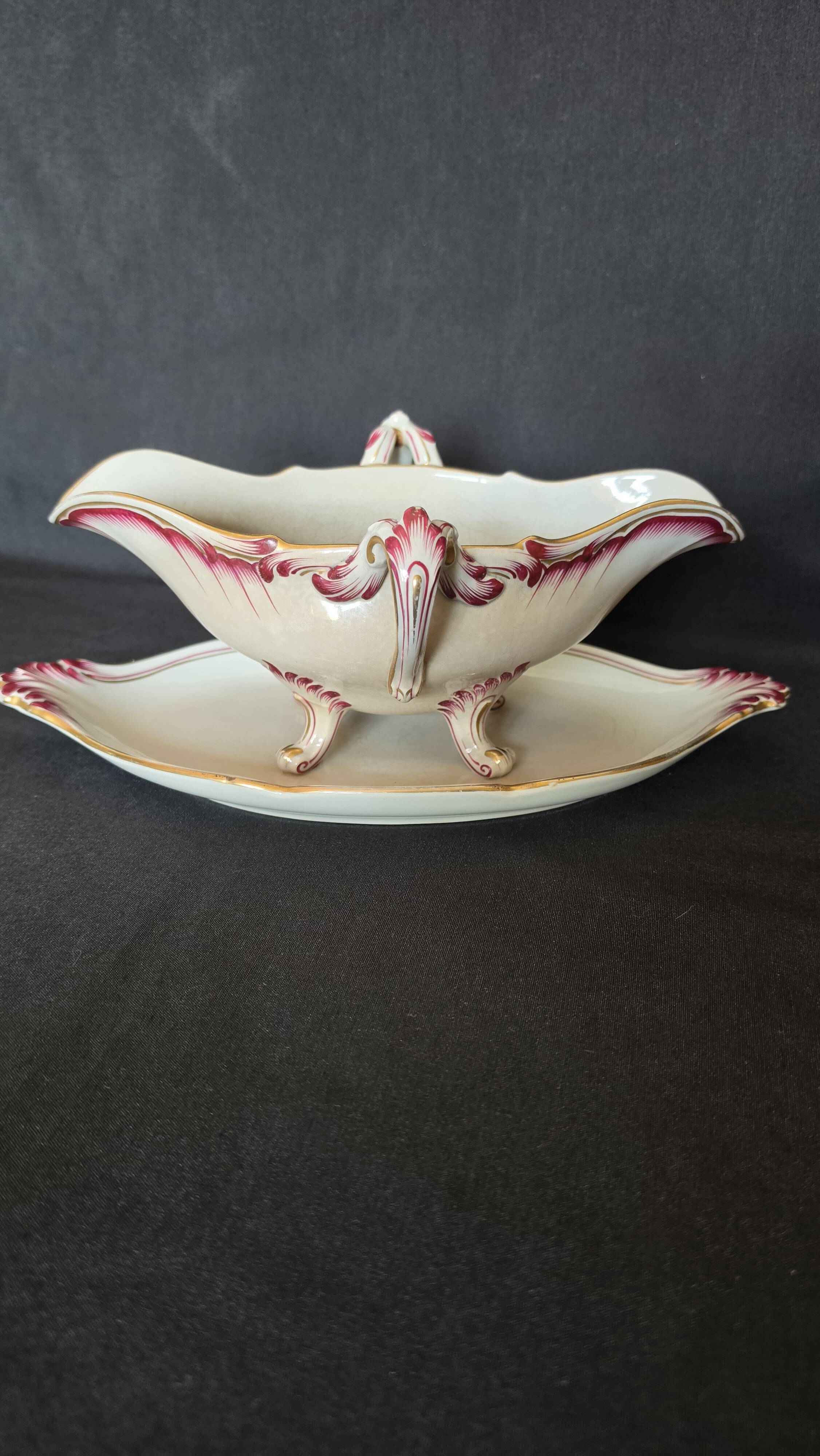 Antique sauce boat in fine earthenware from Sarreguemines, France, neo style.