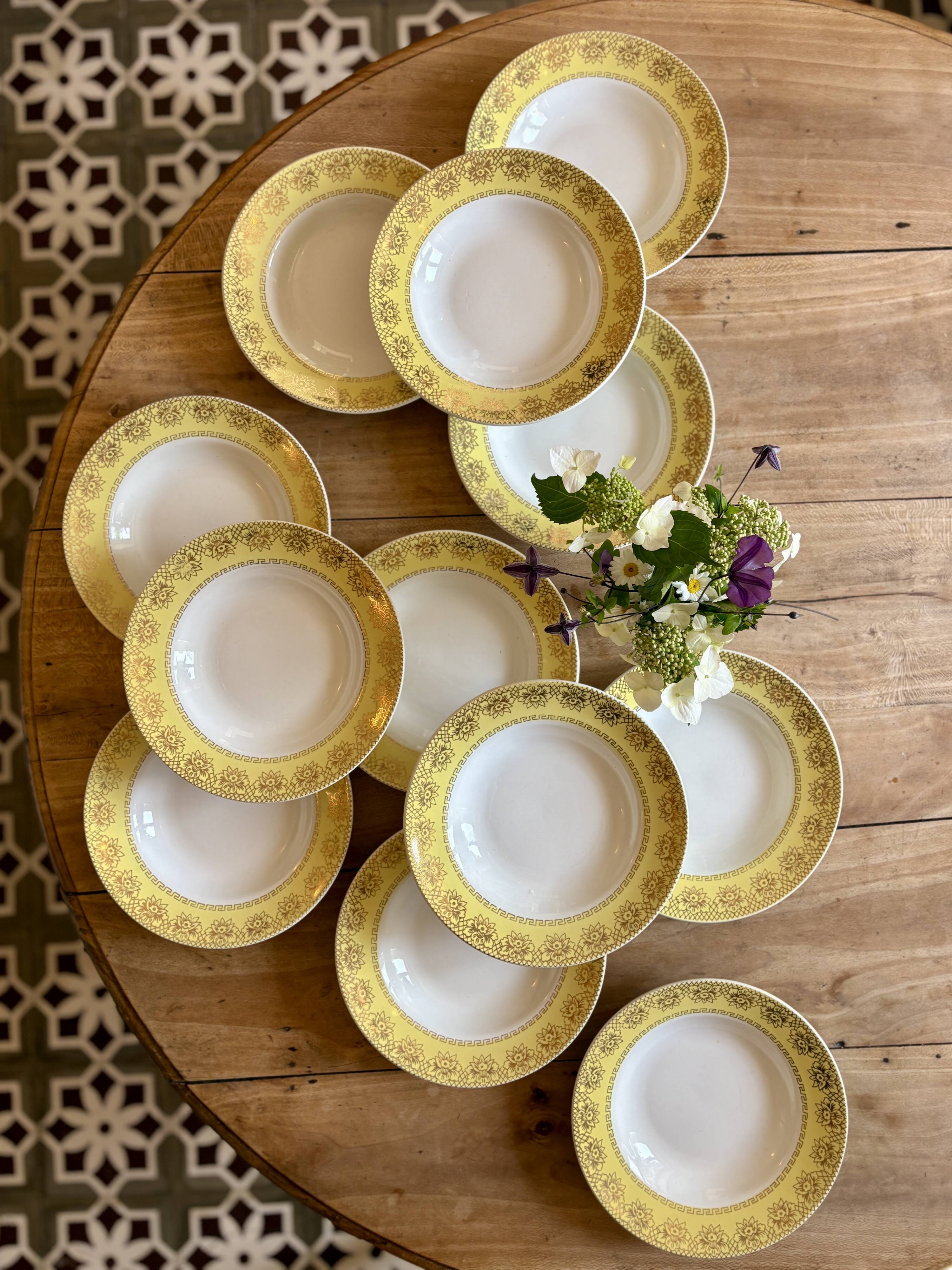 Set of 12 vintage yellow, white and gold soup plates