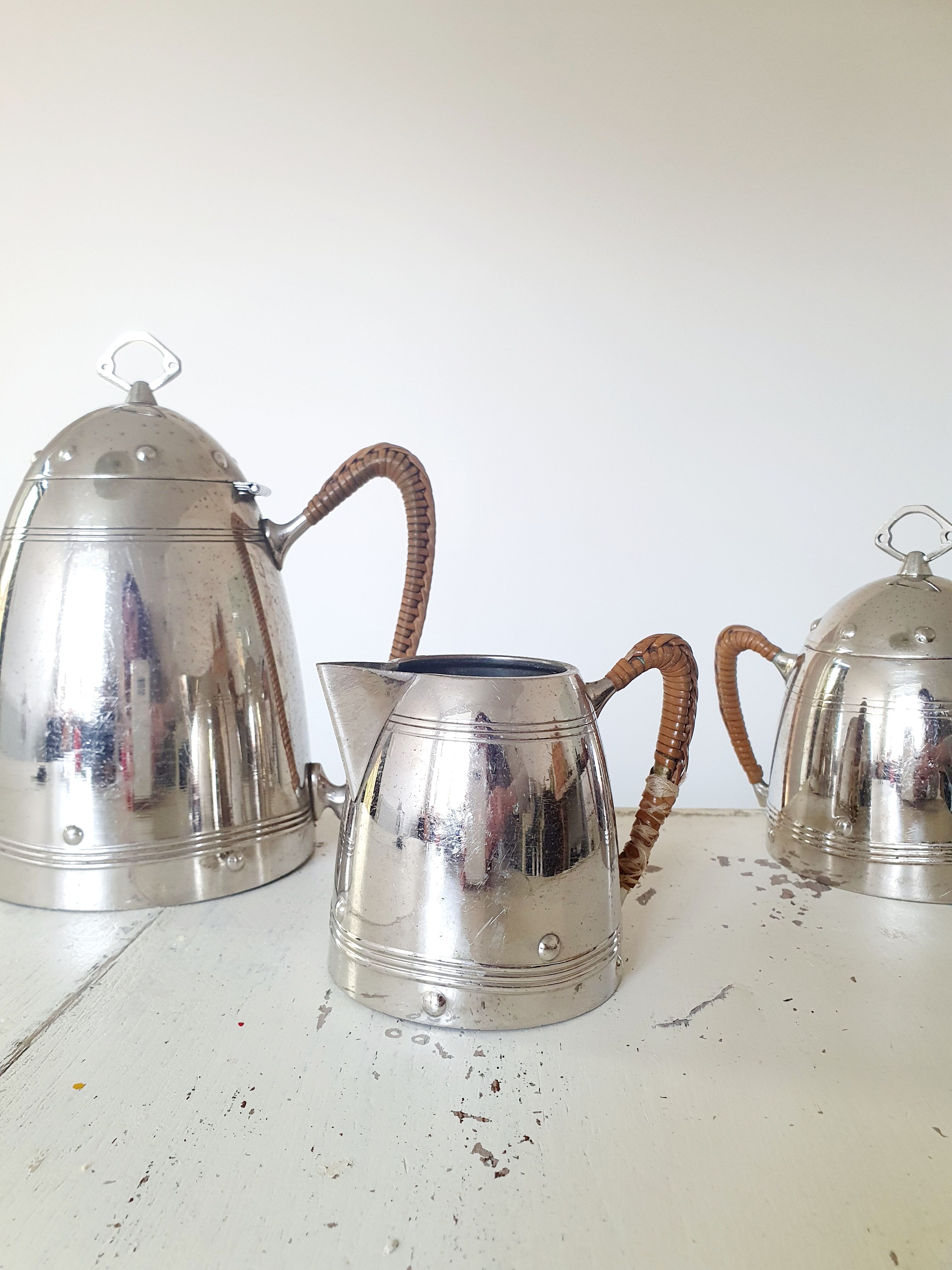 Coffee maker, milk pot and sugar bowl set