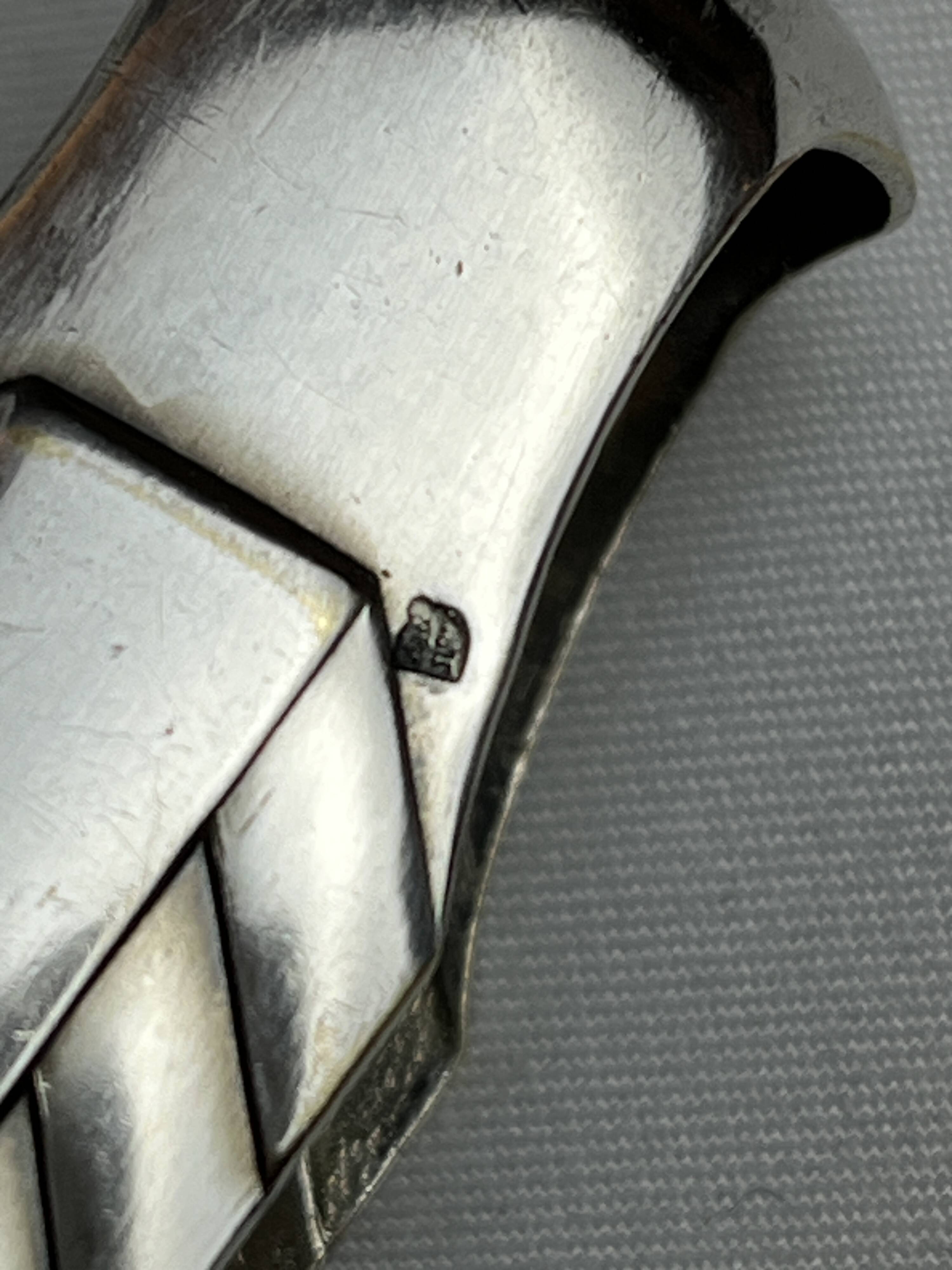 Art Deco, silver-plated sugar tongs from around 1930.